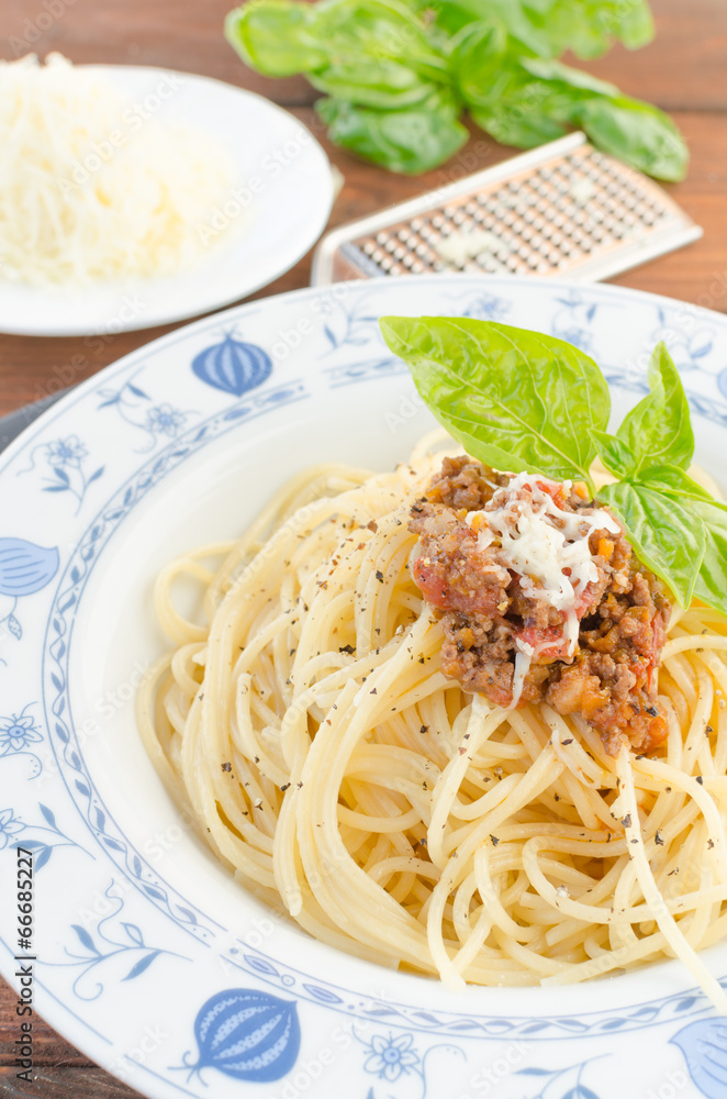 Spaghetti Bolognese on wood table Spaghetti Bolognese on wood table