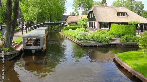 Typical Dutch houses and gardens in Giethoorn, The Netherlands