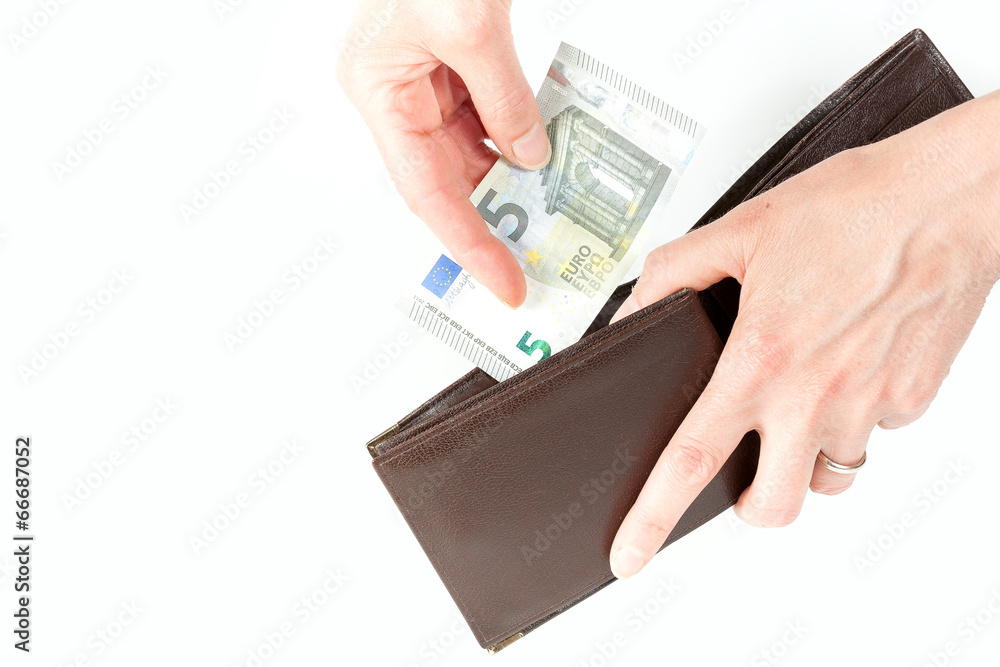 Mani di donna inseriscono 5 euro nel portafogli Stock Photo | Adobe Stock