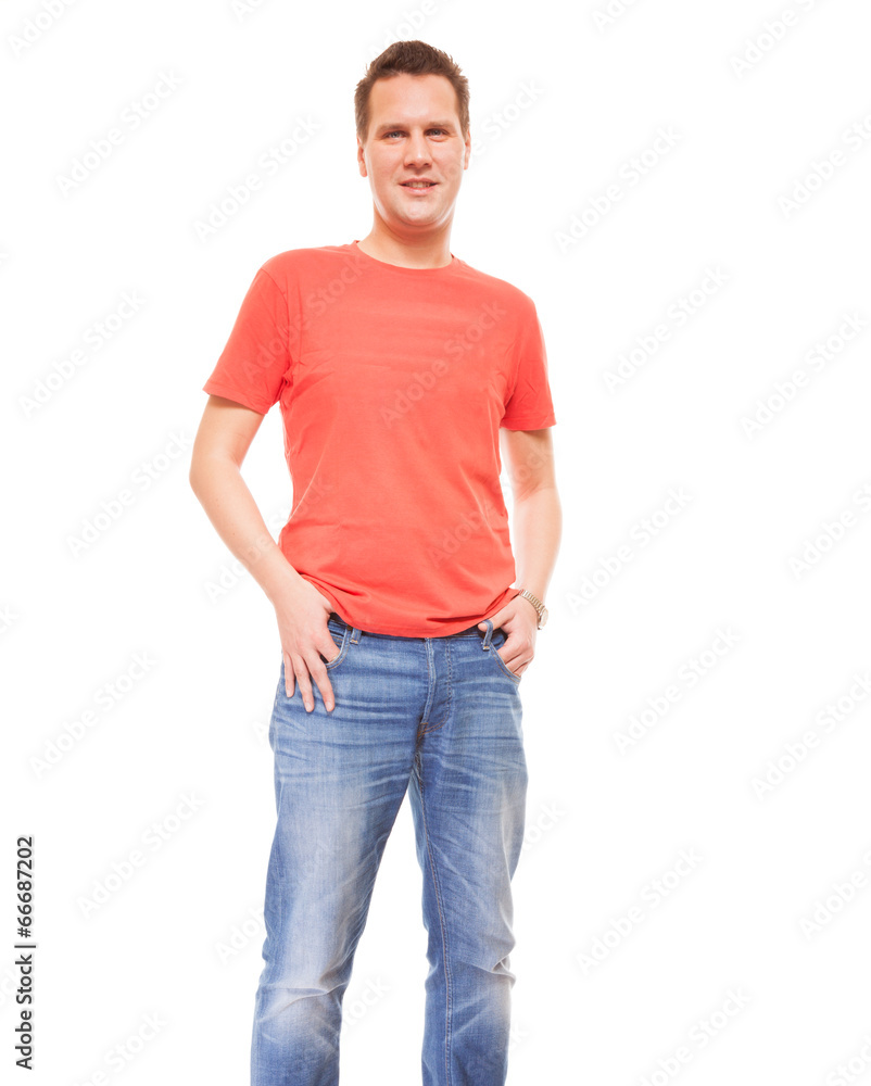 Young man guy red t-shirt jaens with hands in pockets isolated Young man guy red t-shirt jaens with hands in pockets isolated
