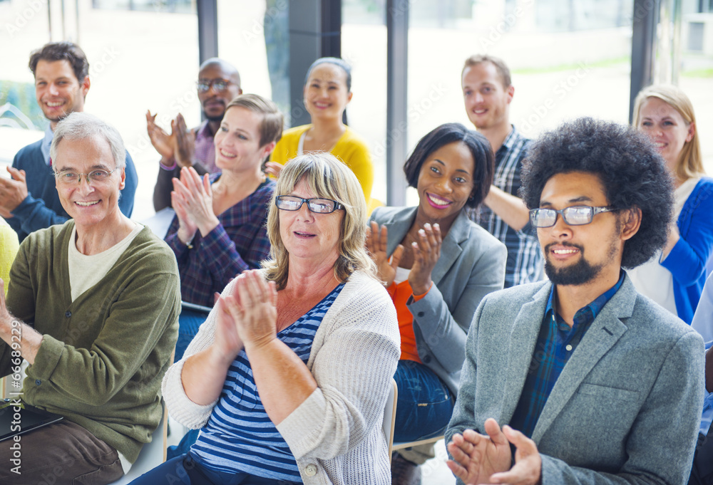 Group of Cheerful People Clapping with Gladness