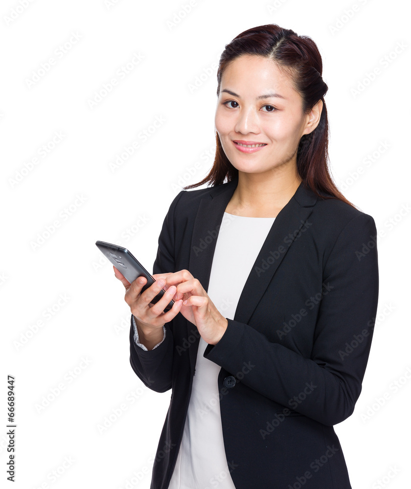 Businesswoman use mobile phone for text message Businesswoman use mobile phone for text message