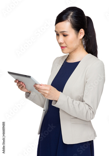 Business woman look at tablet
