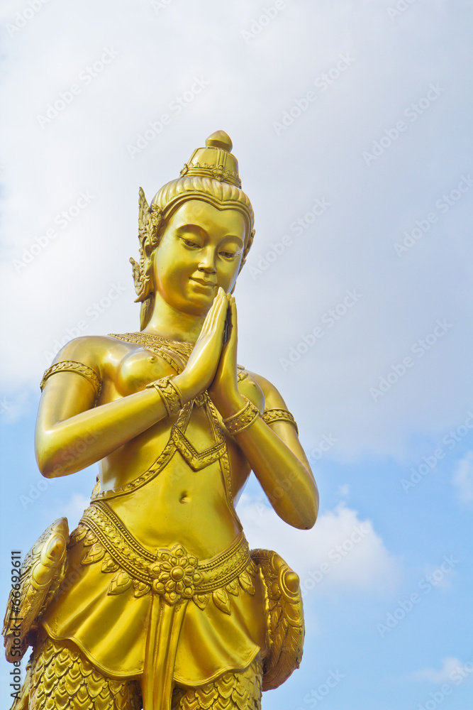 Fototapeta premium Kinnaree; Mythical female bird with a human head at the temple