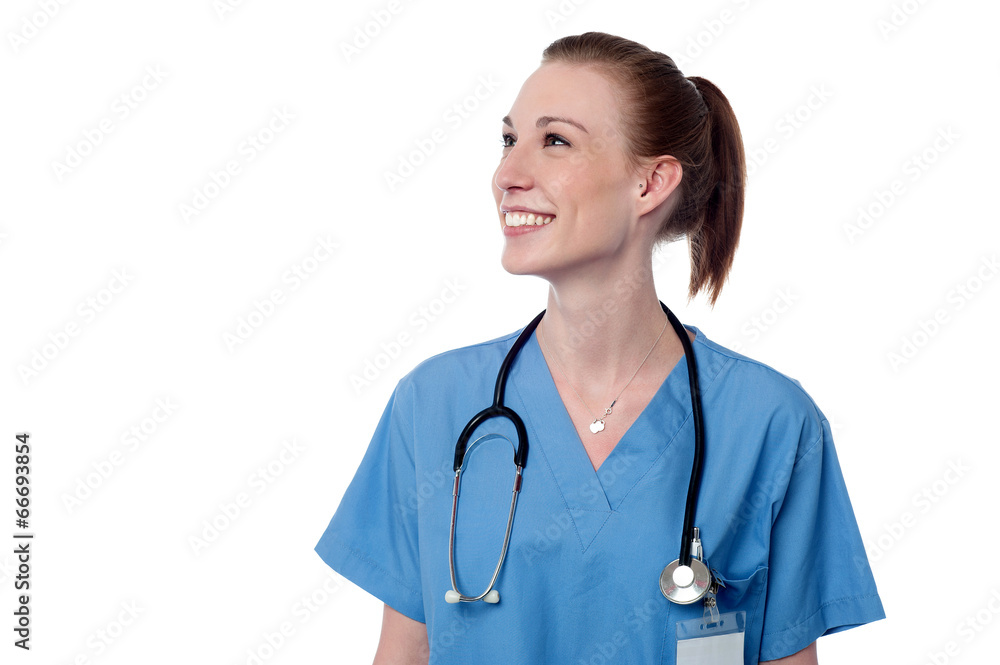 Smiling young female doctor posing Smiling young female doctor posing