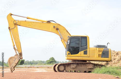 Heavy excavator loader at soil moving works