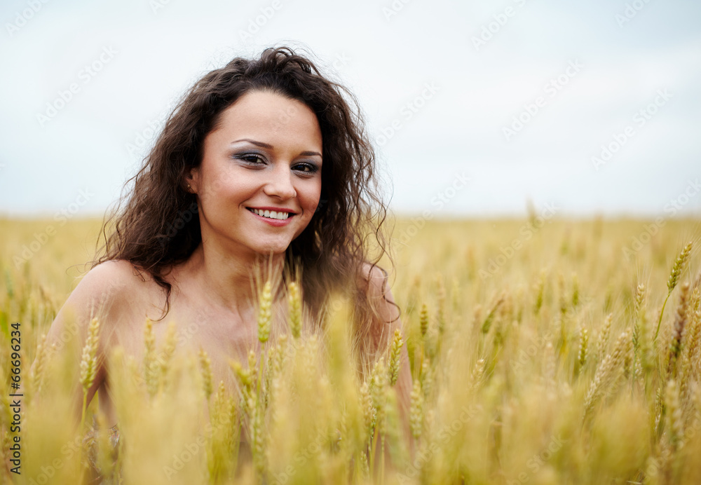 Happy young woman in wheat field Happy young woman in wheat field