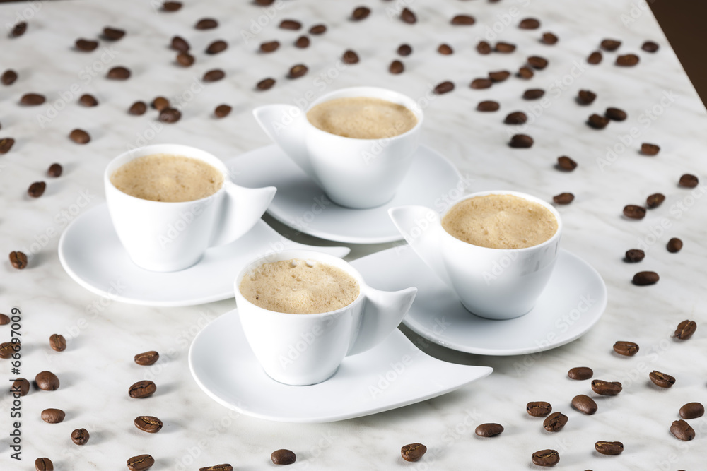 Fototapeta premium four cups of coffee with milk