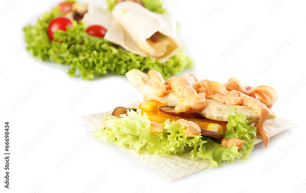 Veggie wrap filled with chicken and fresh vegetables isolated Veggie wrap filled with chicken and fresh vegetables isolated