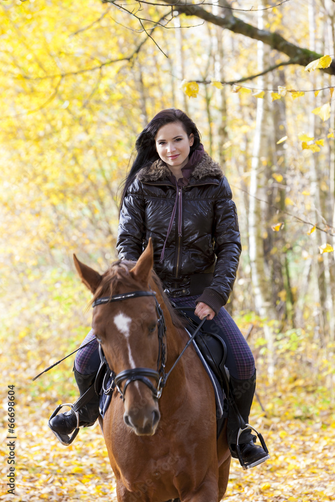 equestrian on horseback in autumnal nature equestrian on horseback in autumnal nature