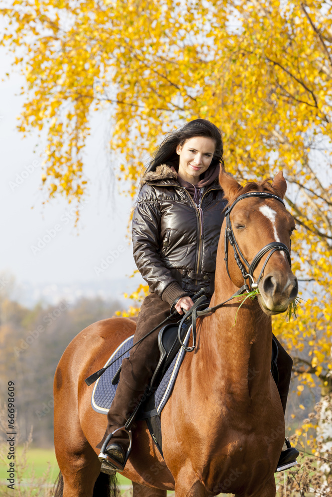 equestrian on horseback in autumnal nature equestrian on horseback in autumnal nature