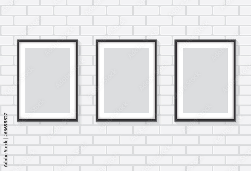 White brick wall with frames White brick wall with frames