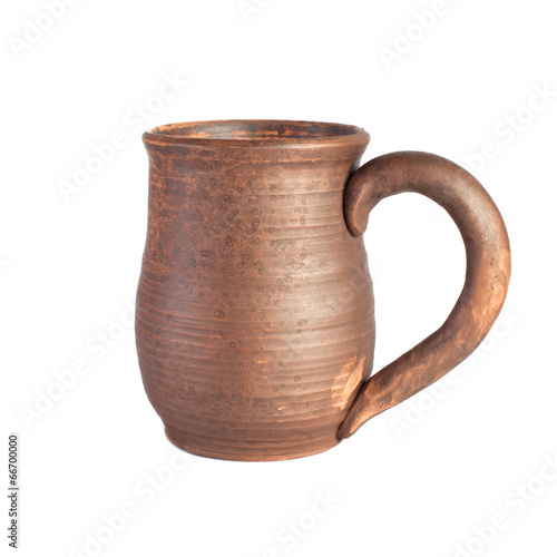 Old clay beer mug isolated on white
