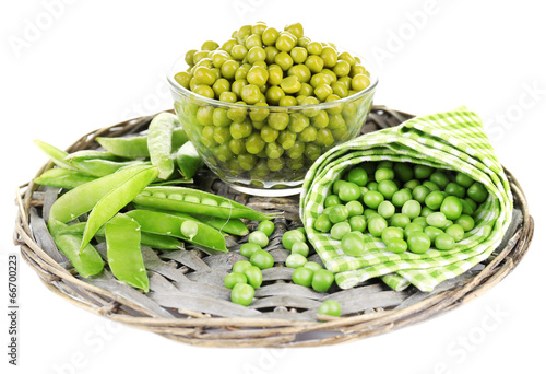 Fresh  and canned peas in glass bowl