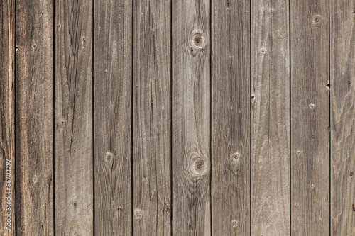 old grey planks with fading brown varnish
