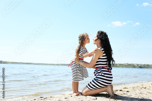 Happy mom and daughter. Wal...