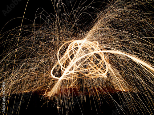 Light painting, abstract scribble with sparks, pattern. 