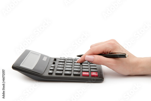 Woman's hands counts on the calculator