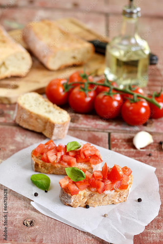 Tomato bruschetta - bread toast with tomatoes, garlic Tomato bruschetta - bread toast with tomatoes, garlic