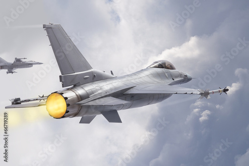 Canvas Print F-16 Fighting Falcon jets (models) fly through clouds