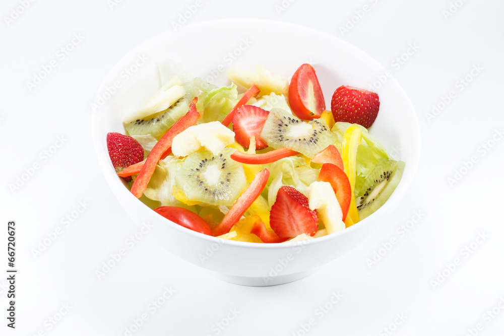 Fresh vegetable salad isolated on white Fresh vegetable salad isolated on white