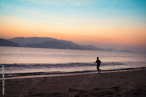 Man running on the beach