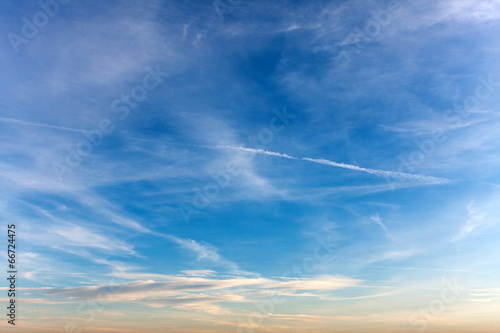 Sky with Airplane Exhaust Sreams photo