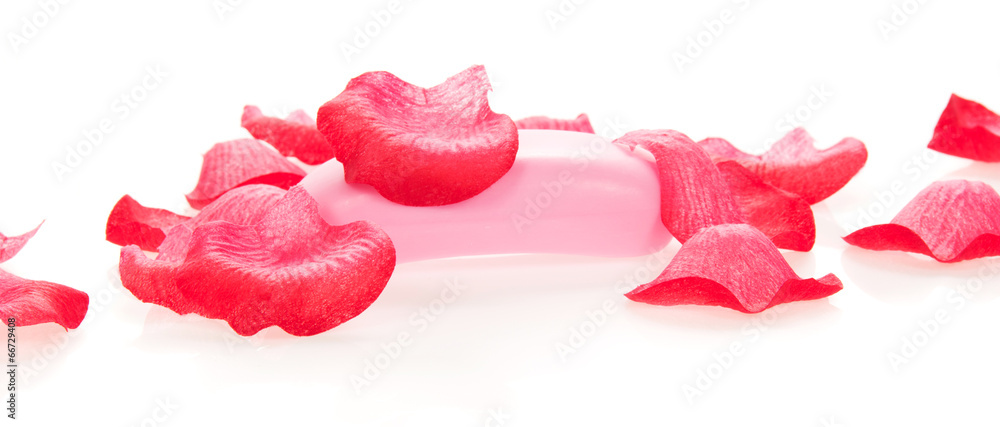 Fototapeta premium Toilet soap under petals of the roses