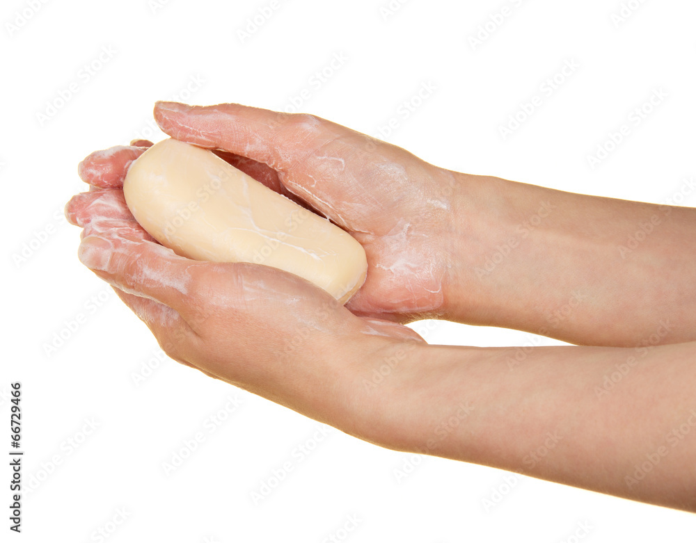 Piece of fragrant soap in the female hands Piece of fragrant soap in the female hands
