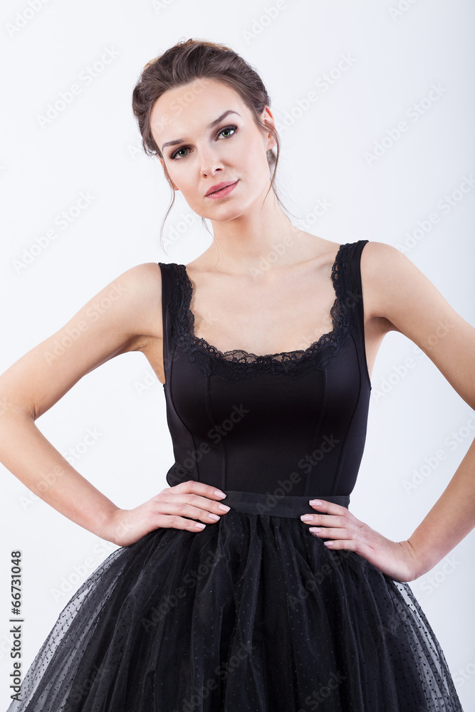Fashion model in stylish black dress