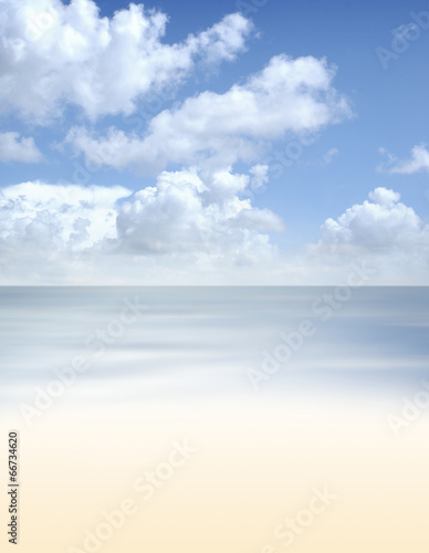 Aerial view of the cloudy sky and the blue sea