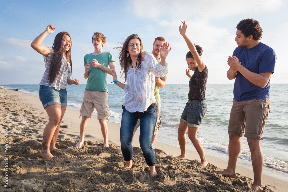 Multiracial Group of Friends Having a Party at Beach - obrazy, fototapety, plakaty 