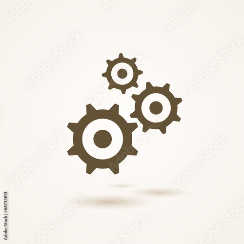 Set of three gears or cogs in different sizes