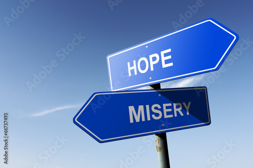 Slika na platnu Hope and Misery directions.  Opposite traffic sign.
