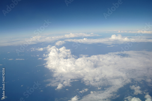 clouds and blue sky seen from plane