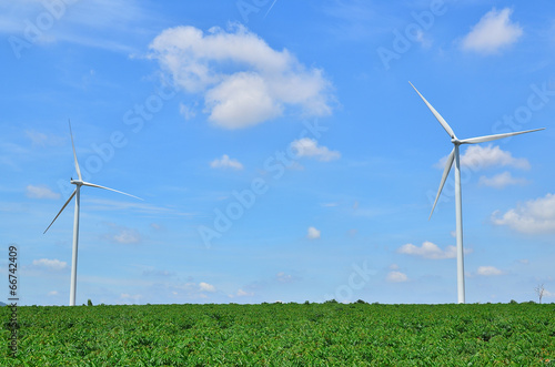 Wind Turbines on Blue Sky Background