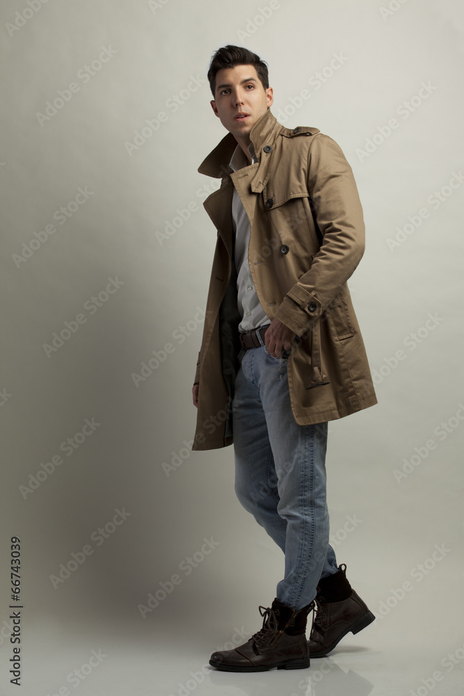 Fototapeta premium young man posing on gray background