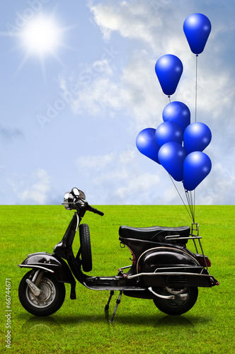 Retro scooter and colorful balloon