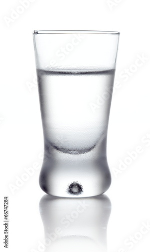 Fotografija Glass of vodka isolated on white