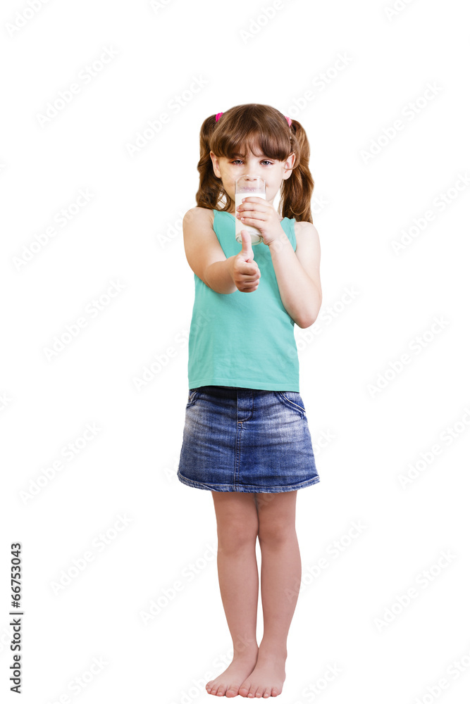 5-6 years old girl with a glass of milk drinks