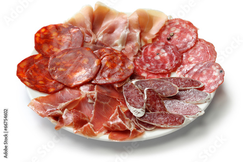 various types of  spanish salami, sausage and ham. photo