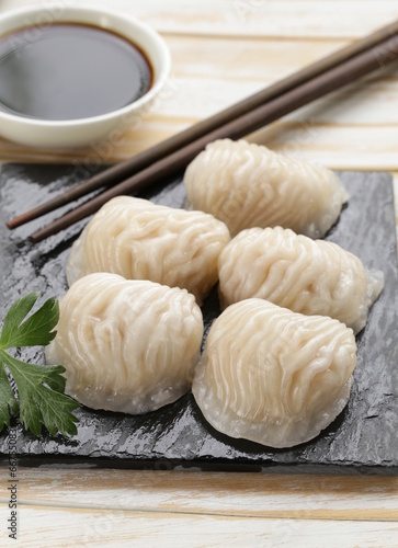 Quadro em tela Asian steamed meat dumplings dim sum with soy sauce