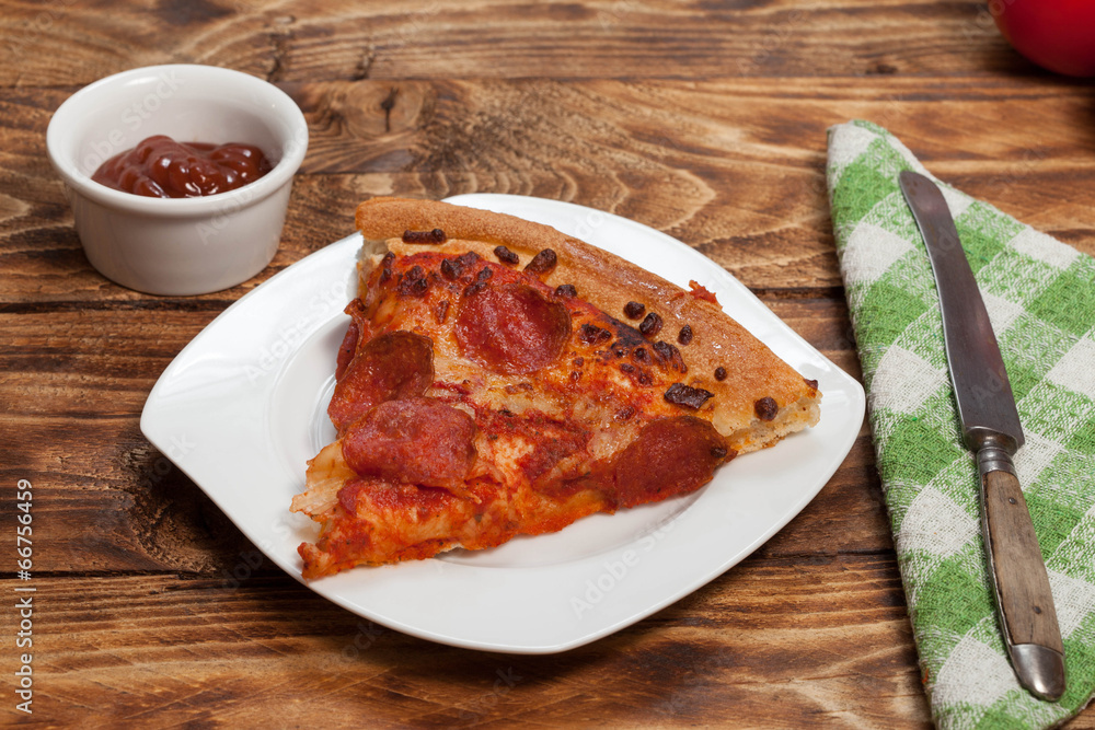 One slice of pizza. One slice of pizza.