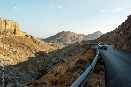 Car driving through Kourtaliotiko Gorge, Crete, Greece photo