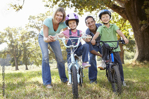 Parents with young children on bikes