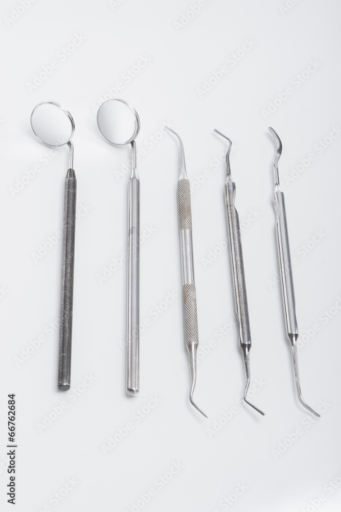 Set of Dental Tools for Teeth Treatment Isolated on White Backg Set of Dental Tools for Teeth Treatment Isolated on White Backg
