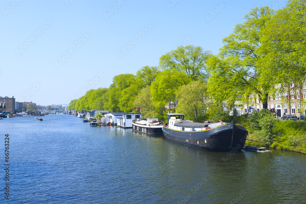 Boats on the canal in East of Amsterdam city center