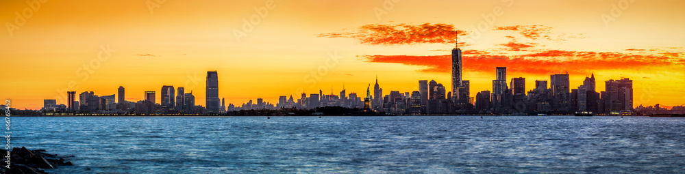 Panorama with Jersey City and New York at sunrise