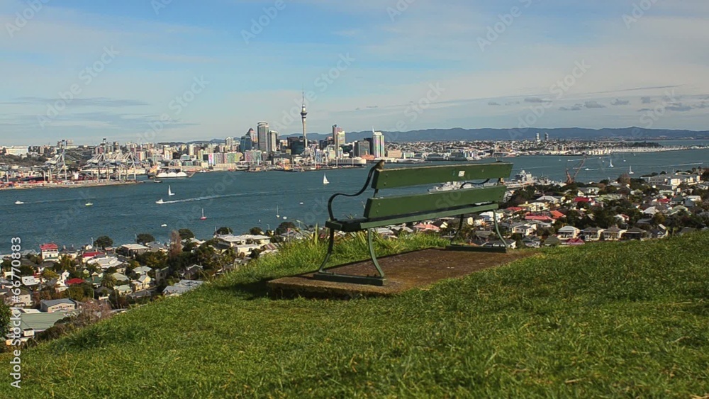 Empty bench facing Auckland skyline view Empty bench facing Auckland skyline view