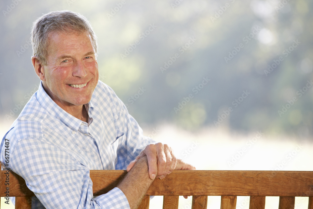 Senior man sitting outdoors Senior man sitting outdoors